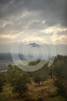 Landscape view of the Umbrian hills in Italy on a foggy day