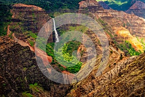 Landscape view of Waipoo waterfall in Waimea canyon, Kauai, Hawaii photo