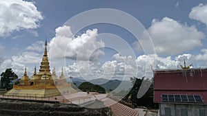Landscape view of Wat Koh Pha Doh Koh Pha Doh temple with Maha Chedi, the golden pagoda on the top of the mountain, Chiang Mai, Th