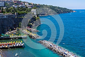 Landscape of Villa Comunale surrounded by the sea under the sunlight in Sorrento, Italy photo