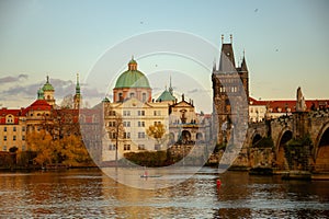 landscape with Vltava river and Karlov most in the evening in autumn in Prague