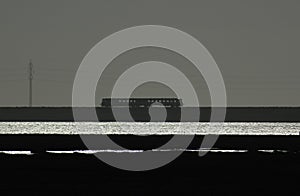 Landscape with water and little motor train