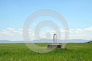 Landscape with a water well