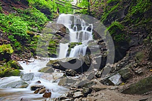 Landscape of waterfall Shypit in the Ukrainian Carpathian Mountains on the long exposure in summer morning. Zakarpattya, Ukraine