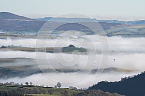 Landscape of the Welsh Valleys covered in the fog in Denbighshire photo