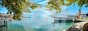 Landscape with wharf and touristic old ferry on Geneva Lake in Vevey town. Vaud canton, Switzerland