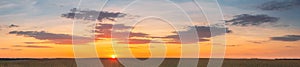 Landscape Of Wheat Field Under Scenic Summer Dramatic Sky In Sunset Dawn Sunrise. Skyline. Panorama, Panoramic View