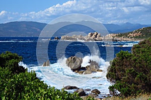 Landscape with wild waves of the Mediterranean Sea crashing on the shore, Campomoro, Corsica, France