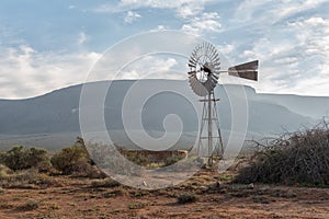Landscape, with windmill and dam, in the Tankwa Karoo