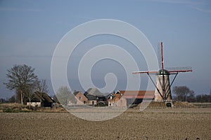 Landscape with Windmill. Zeeland, the Netherlands photo