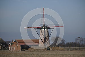 Landscape with Windmill. Zeeland, the Netherlands photo