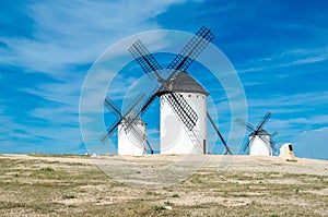 Landscape with windmills in Campo de Criptana, Spain, on the famous Don Quixote Route photo