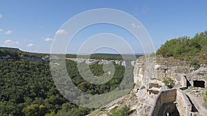 Landscape through the windows cut into the rock. Chufut-Kale is a cave city.