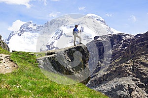 Landscape with with woman with backpack., Switzerland.