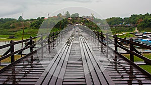 Landscape of Wooded bridge over the river (Mon Bridge) in Sangkhlaburi District, Kanchanaburi, Thailand