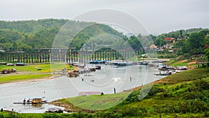 Landscape of Wooded bridge over the river (Mon Bridge) in Sangkhlaburi District, Kanchanaburi, Thailand