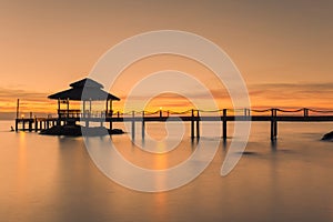 Landscape of Wooded bridge pier between sunset. Summer travel in