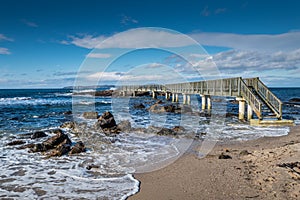 Landscape wooden bridge at Ballycastle beach, Northern Ireland