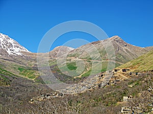 Landscape of Zagros mountains and Kurdish village , western Iran