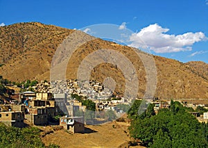 Landscape of Zagros mountains and Kurdish village , western Iran