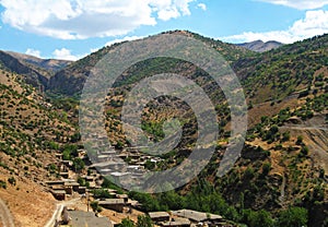 Landscape of Zagros mountains and Kurdish village , western Iran
