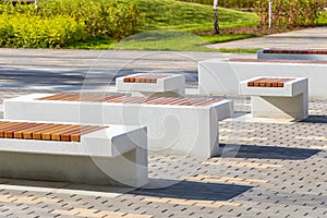 Landscaped courtyard and courtyard decoration. Benches in the courtyard of a modern residential complex. Comfortable and