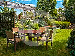 dining table set in lush garden