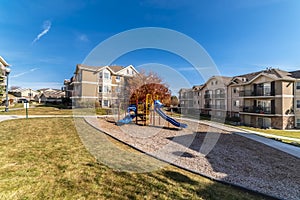 Landscaped grounds and urban park with playground