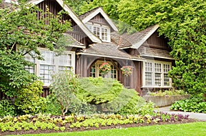 Landscaped log cottage in woods