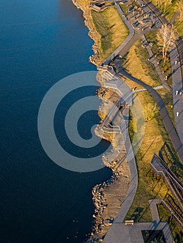 Landscaped park on the banks of the river. City infrastructure. Krasnoyarsk city Belye Rosy district