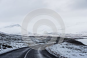 Landscaped of the road in winter, with blizzard storm coming