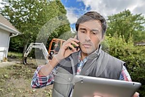 Landscaper on the phone