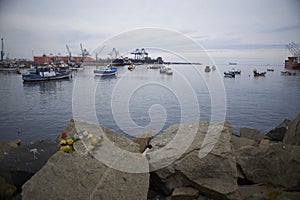 Landscapes of boats and the surroundings of the port of San Antonio, Chile photo