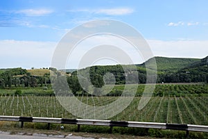 Landscapes of Crimean nature. Fields and hills visible from the car window from the road