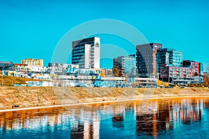 Landscapes of modern part of  Vilnius and Vilna River photo