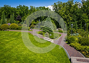 Landscaping in the garden. The path in the garden.Beautiful back