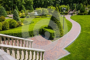 Landscaping in the garden. The path in the garden.Beautiful back