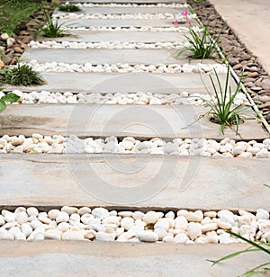 Landscaping modern simple stone pathway in garden decoration wit