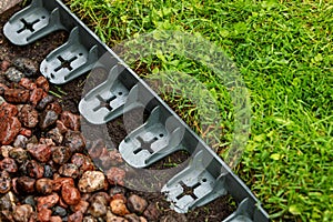 Landscaping - plastic lawn edging in the garden