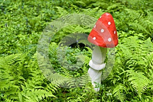 Landscaping with a wooden mushroom