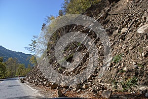 A landslide blocking part of a mountain road