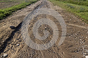 landslides on a country road after heavy rains and rains in summer