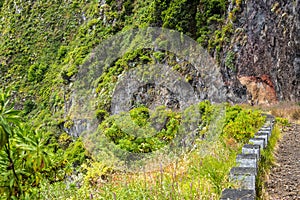 Landslides wiped out the coast road at Porto Moniz in Madeira and now a waterfall is the main feature