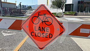 Lane closed sign on the road not allowing bicycles to pass Passage prohibited barrier construction vancouver canada