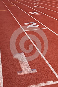 Lanes on a athletic running track with the number