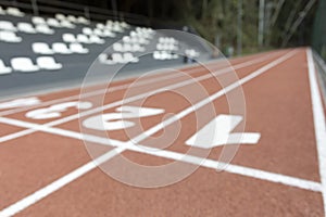 Lanes on a running track with numbers