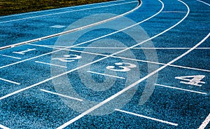 Lanes  on the track field, 1, 2, 3, 4, one, two three four number