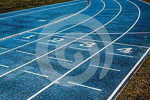 Lanes  on the track field, 1, 2, 3, 4, one, two three four number