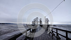 Langbryggan boardwalk at lake Siljan in Rattvik in Dalarna in Sweden photo