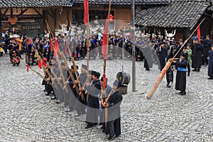 People of the Miao ethnic minority performing a traditional dance in Langde Miao Nationality village, Guizhou province, China